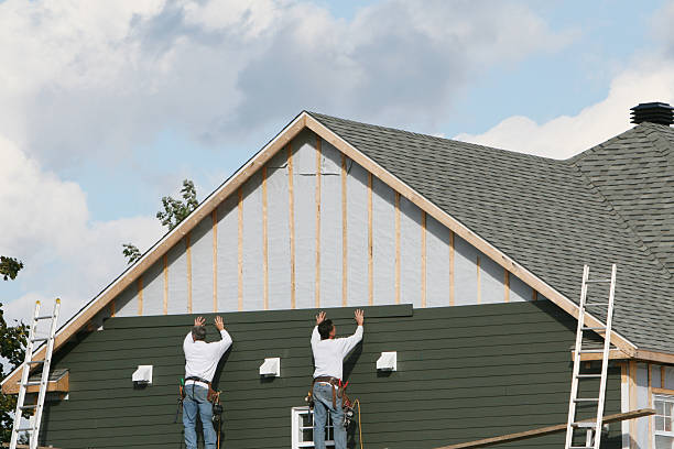 Professional Siding technician working in Advance, NC